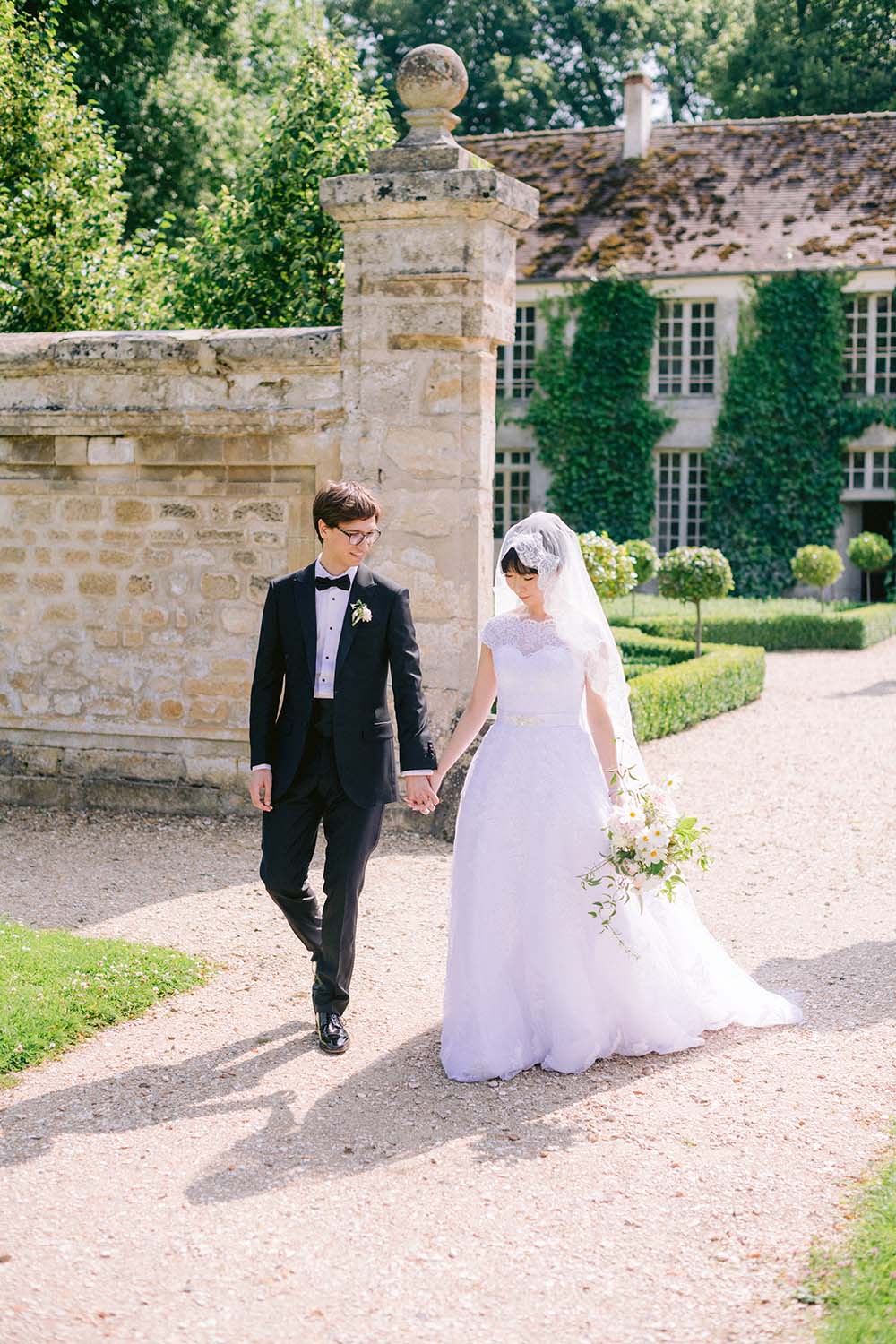 the bride and groom walk